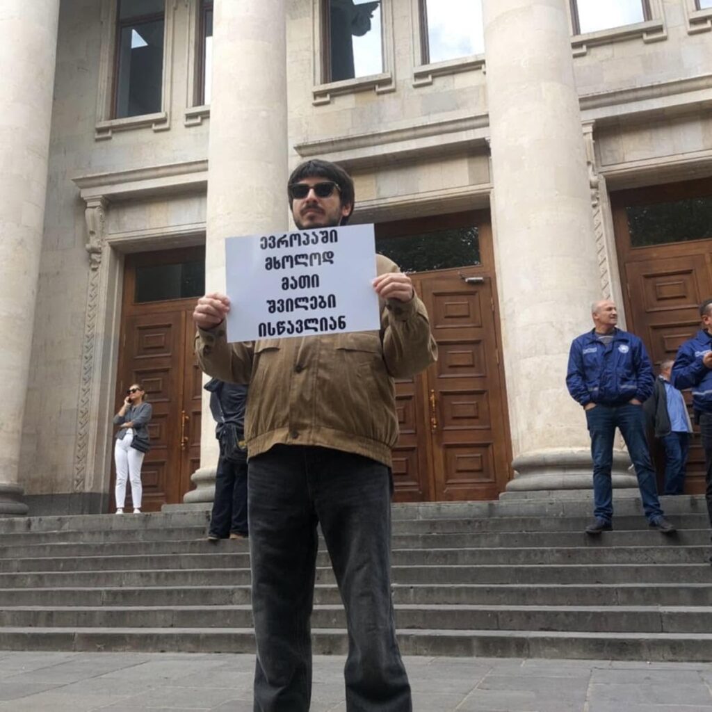 “Only their children study in Europe” — reads the sign held by Onise Okriashvili during one of his solo protests.
Georgia protester Onise Okriashvili beaten