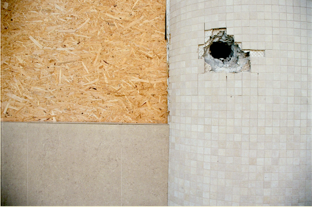 Shrapnel mark from a Russian bomb. Kramatorsk, August 2026. Yulia Kalaban for JAMnews.